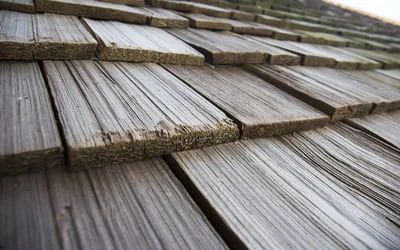 Wood shake shingles with natural grain texture and proper installation overlap