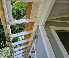 Wood soffit and fascia installation with sealed joints and finished trim details