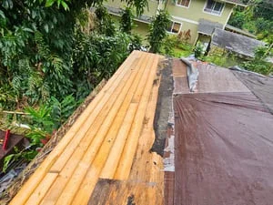 Wood shake shingles installed on residential roof with cedar material and proper underlayment visible
